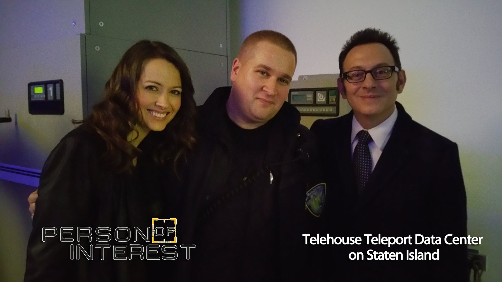 Basil Puglisi in Port Authority Police uniform with Amy Acker, who played Root, and Michael Emerson, who played Harold Finch, on the Person of Interest set at the Telehouse Teleport Data Center on Staten Island
